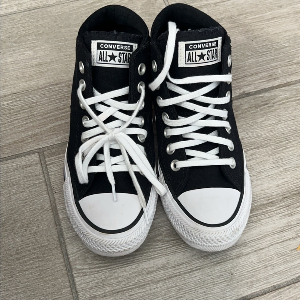 Low top black and white converse